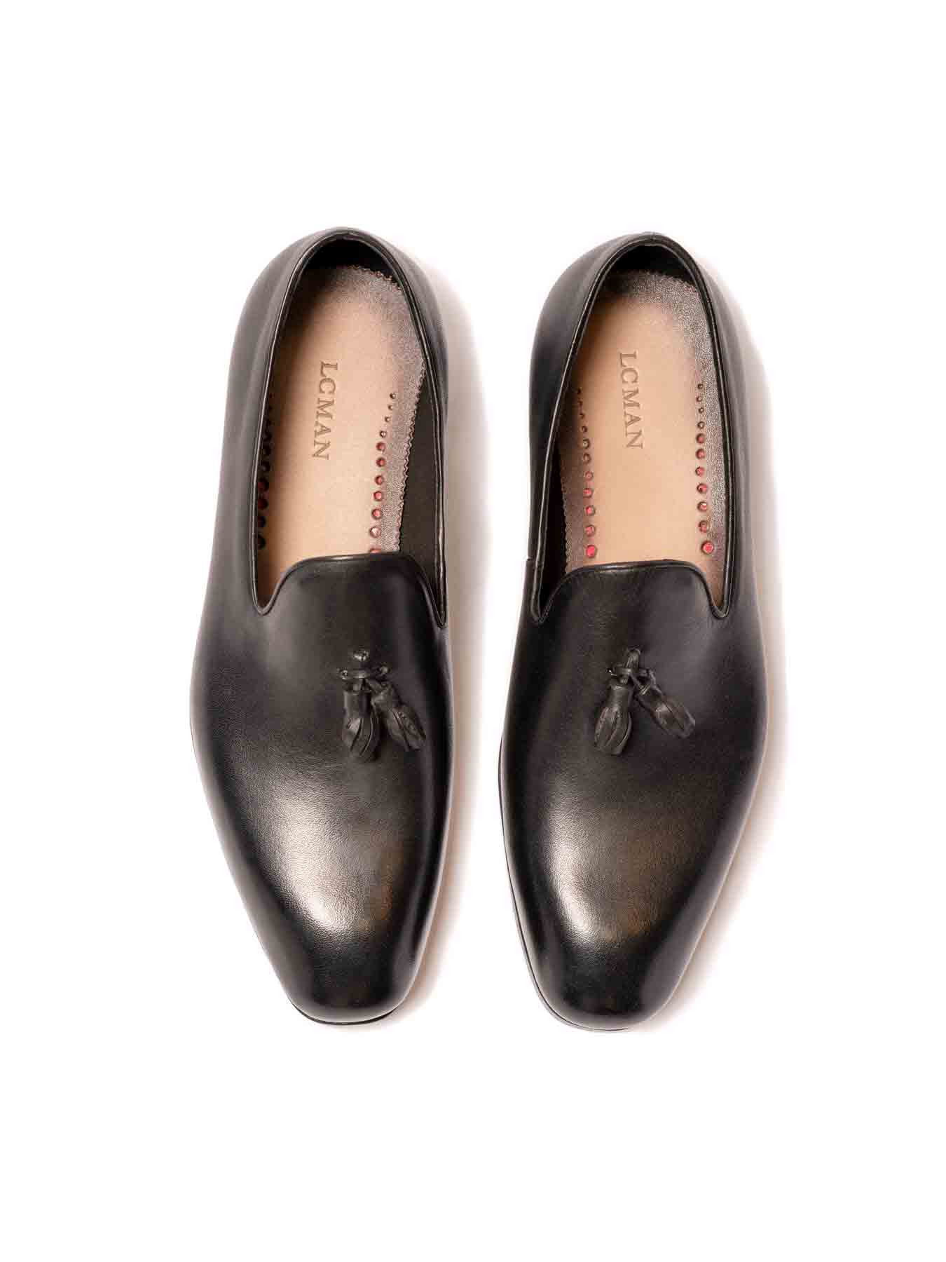 کفش چرم مشکی بدون بند منگوله دار 