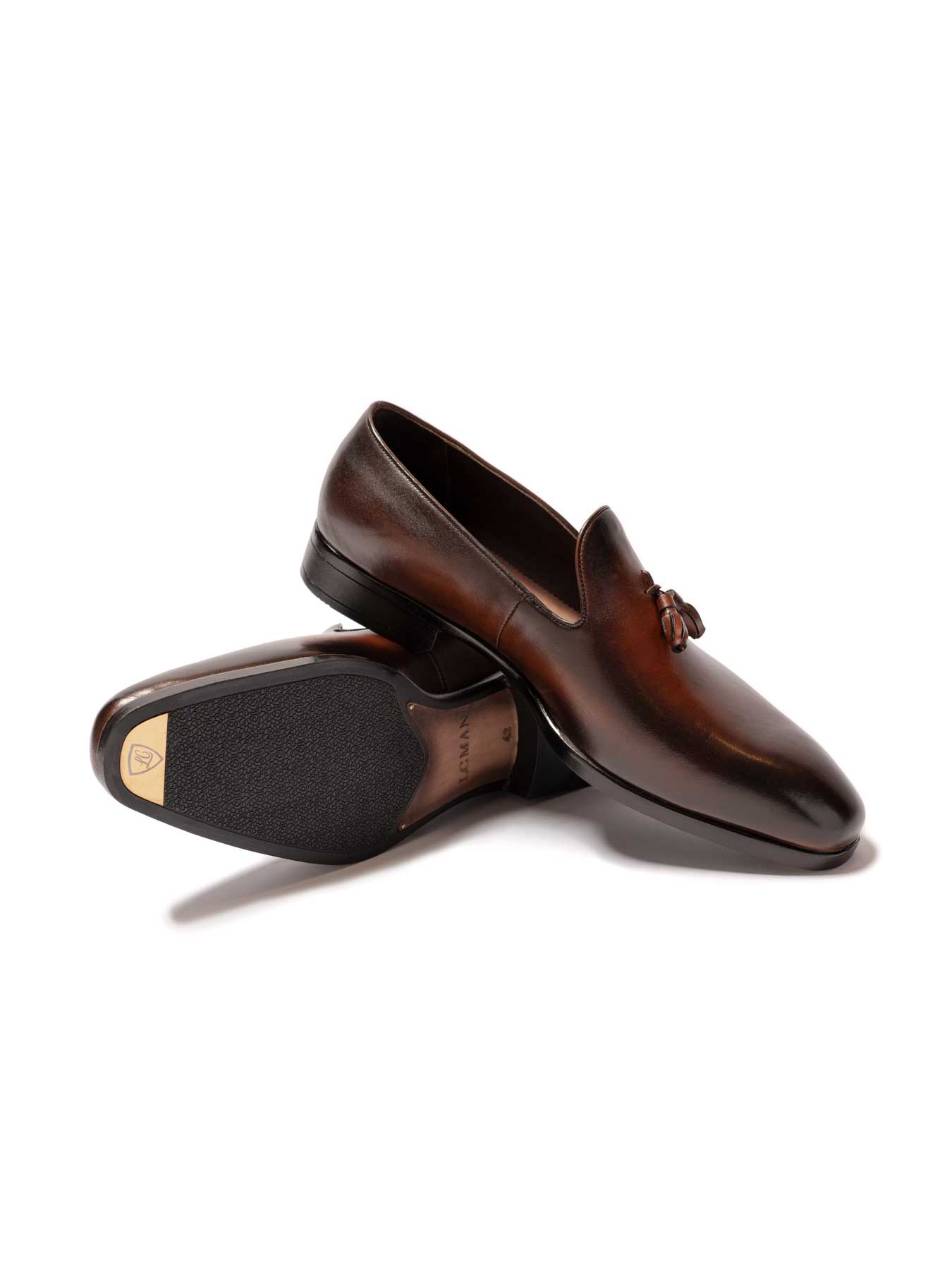 کفش چرم قهوه ای بدون بند منگوله دار 