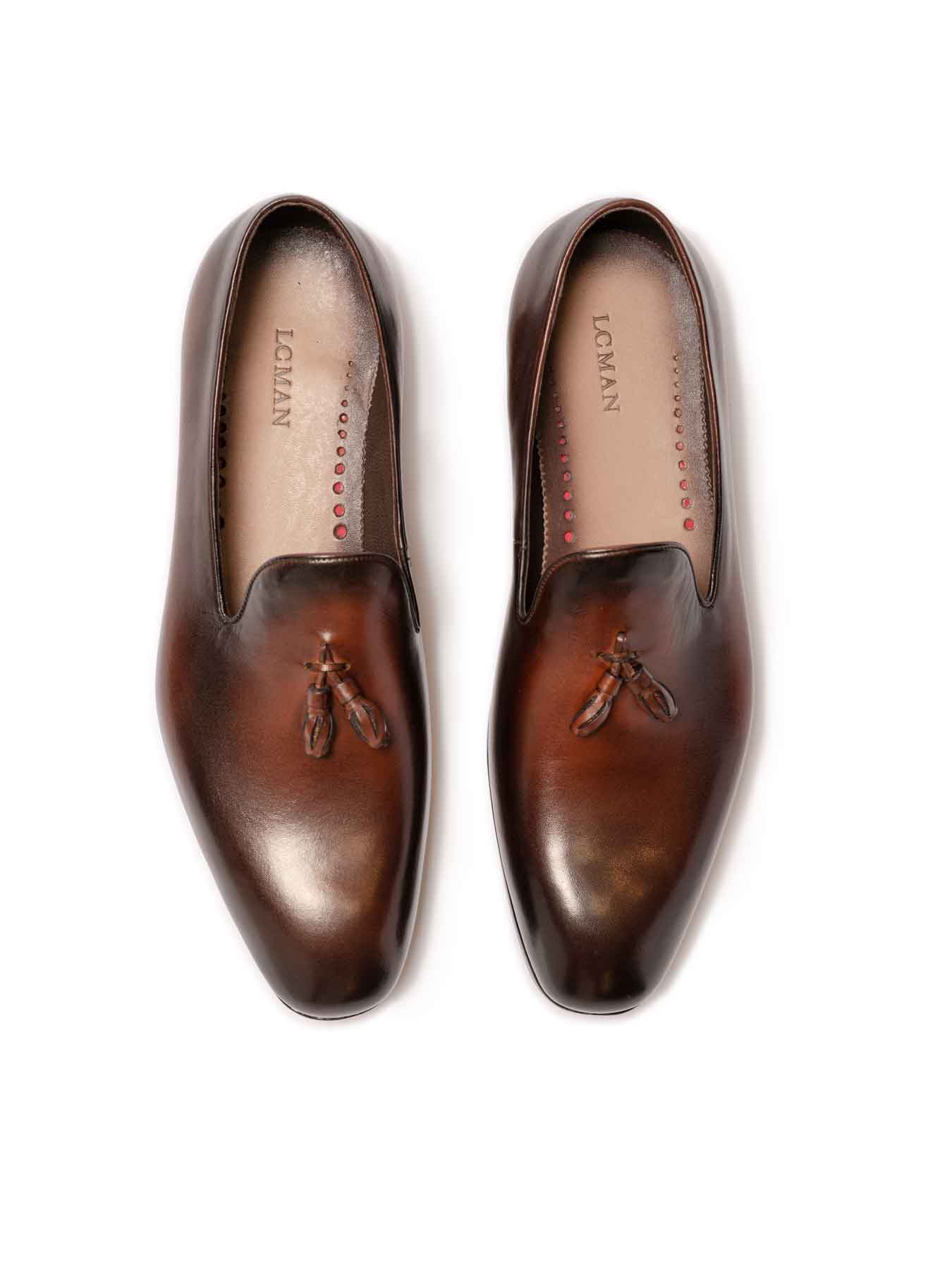 کفش چرم قهوه ای بدون بند منگوله دار 