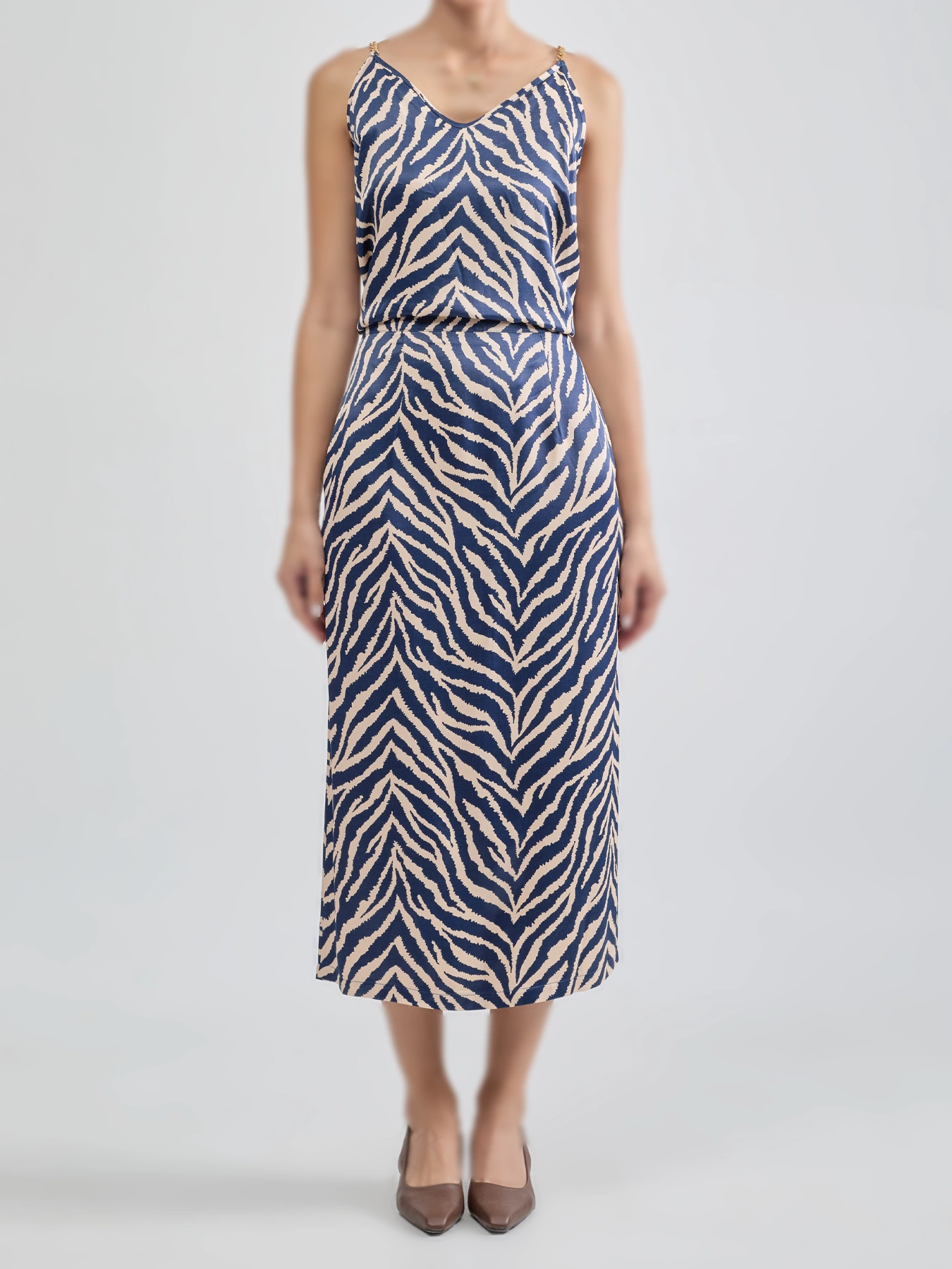 ست تاپ و دامن طرح دار سرمه ای کرم