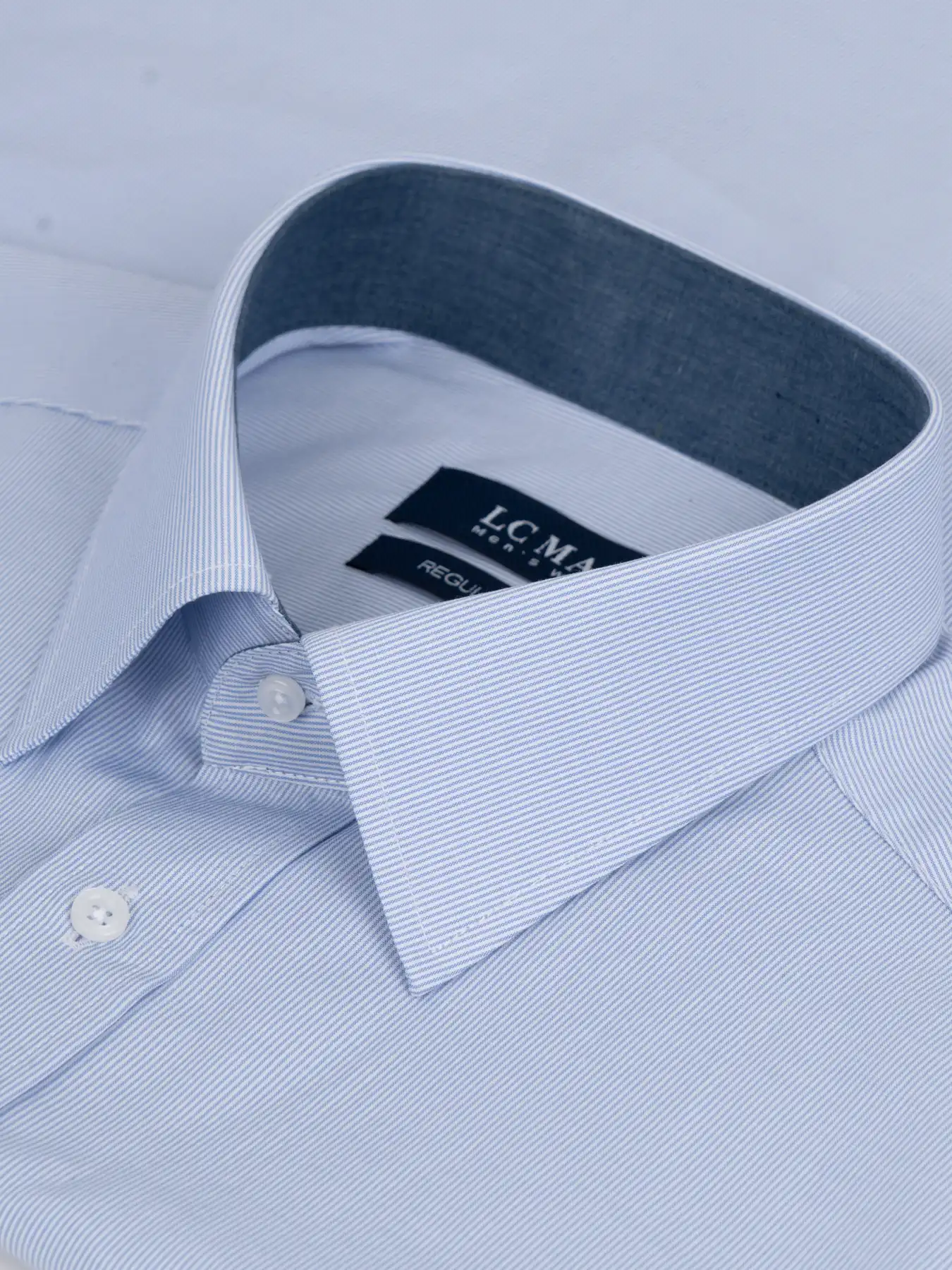 پیراهن آستین بلند آبی راه راه ریز ال سی من 20