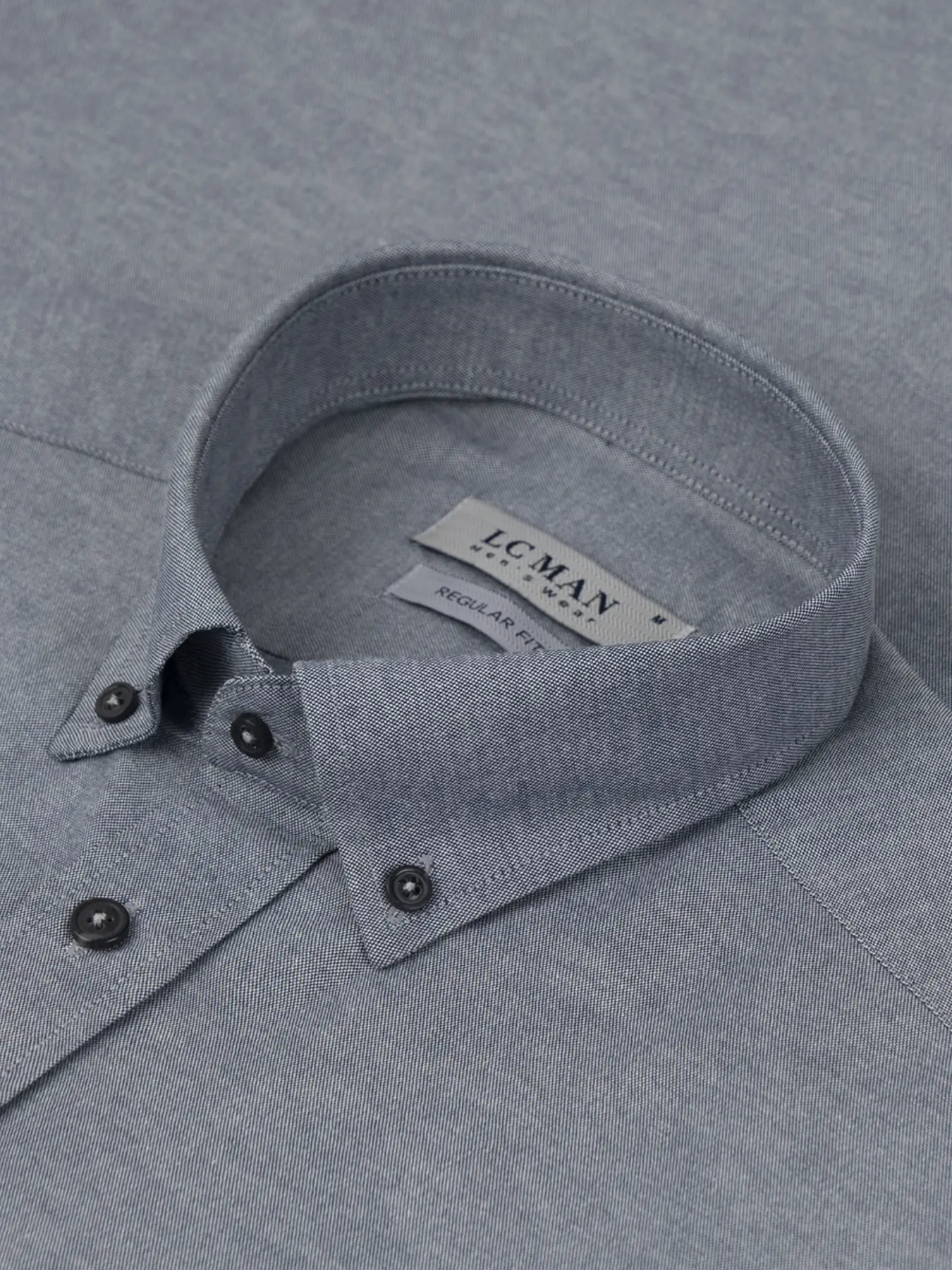 پیراهن آستین کوتاه طوسی ساده یقه دکمه دار ال سی من27