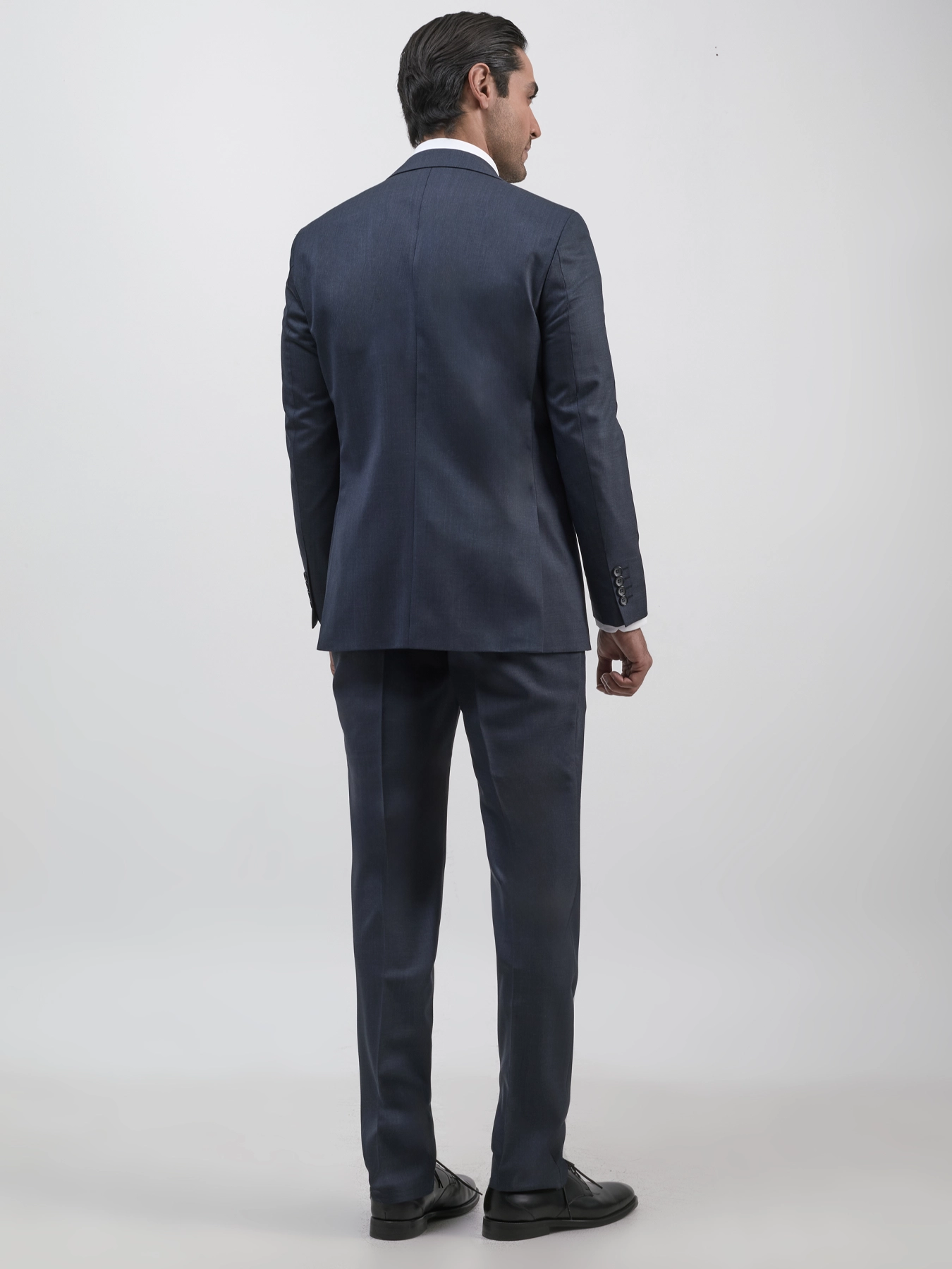 کت و شلوار و ژیله سرمه ای ال سی من 70