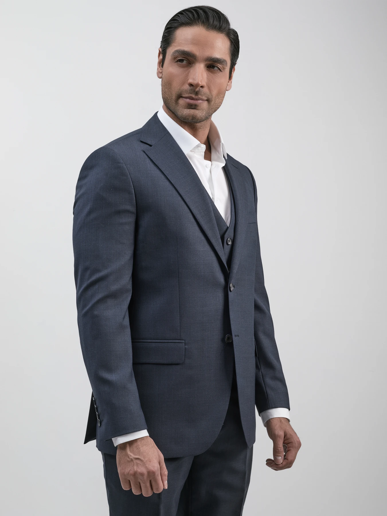 کت و شلوار و ژیله سرمه ای ال سی من 70